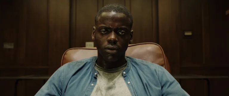 Get Out (2017): A controlled descent into social horror